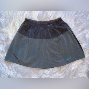 Nike tennis skirt women’s S small dri fit gray mesh lined skort blue swoosh golf